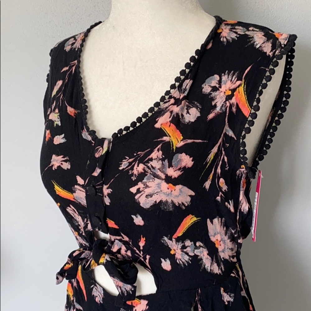 Floral romper with tie front and cut out detailing